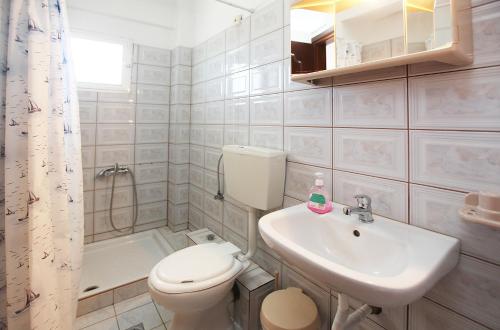 Koupelna v ubytování Hotel Fourkos