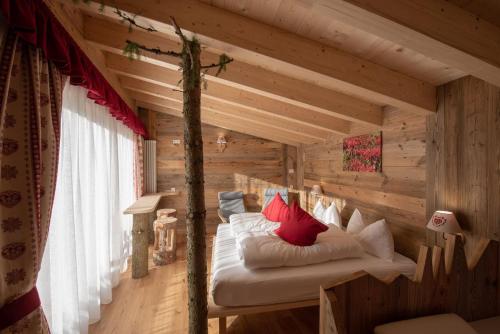 Tempat tidur dalam kamar di Eco-Green Fiores Agriturismo
