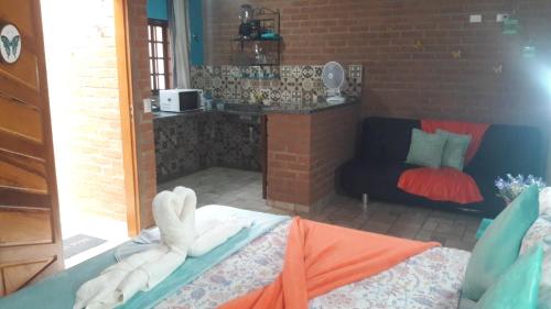 Katil atau katil-katil dalam bilik di Toca Hospedaria - Centro