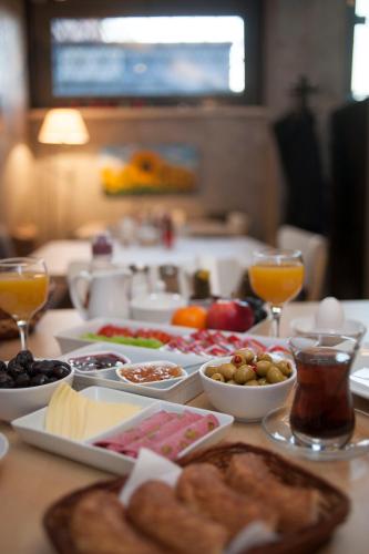 a table topped with different types of food and drinks at Peradays in Istanbul