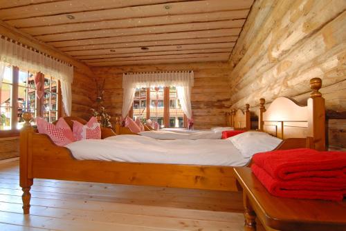 Postel nebo postele na pokoji v ubytování Wellnesshotel Ludinmühle