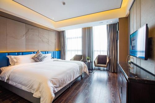 Ruiman International Hotelにあるベッド