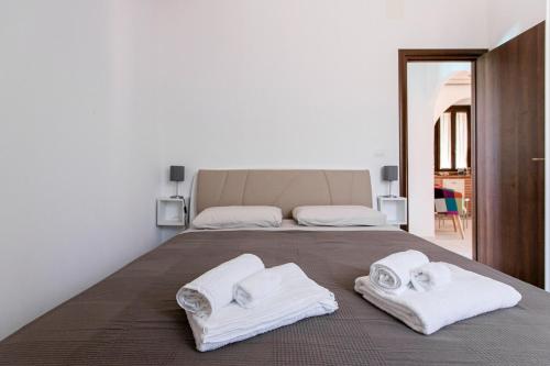 Katil atau katil-katil dalam bilik di House sea Ognina