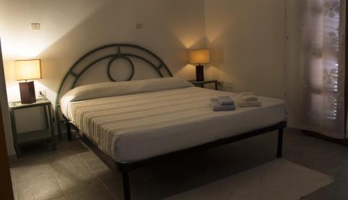 Postel nebo postele na pokoji v ubytování Splendida Vista, Sardegna