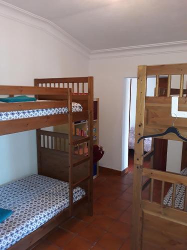 Postel nebo postele na pokoji v ubytování Refugio de São Luis