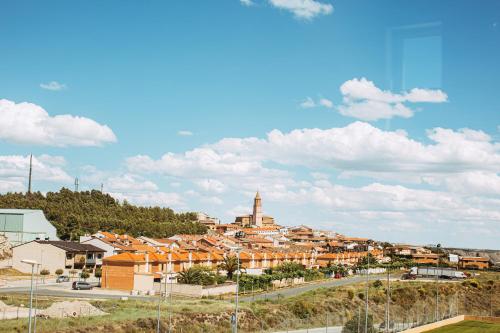 a view of a city with a town at Hotel Villa De Cárcar in Cárcar