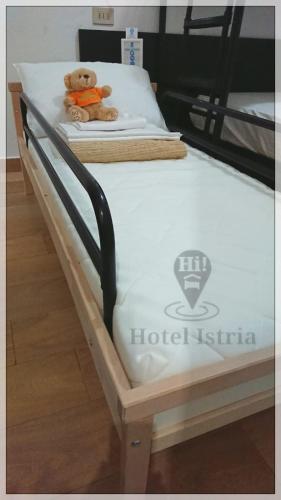 Ein Bett oder Betten in einem Zimmer der Unterkunft Hotel Istria