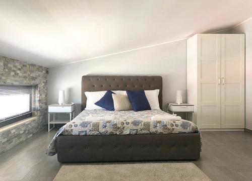Postel nebo postele na pokoji v ubytování Pietra Bianca Rooms