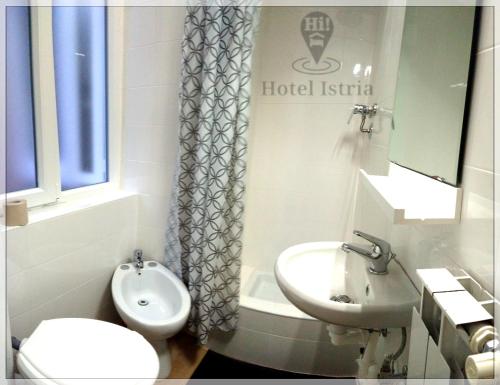 Ein Badezimmer in der Unterkunft Hotel Istria