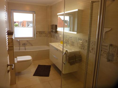 Koupelna v ubytování Büsumer Tide Segelmacherhuus Whg 10