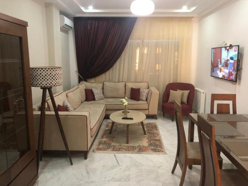 Televisyen dan/atau pusat hiburan di Apartment Jardin Carthage
