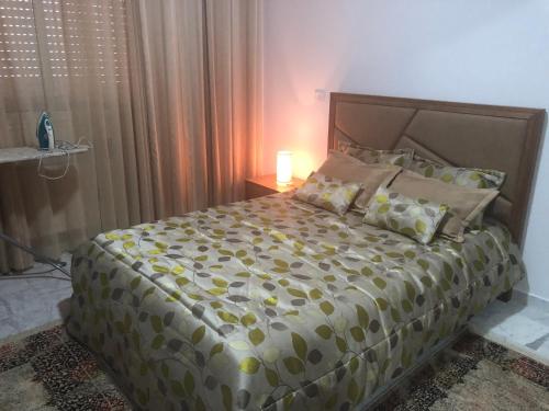 Katil atau katil-katil dalam bilik di Apartment Jardin Carthage