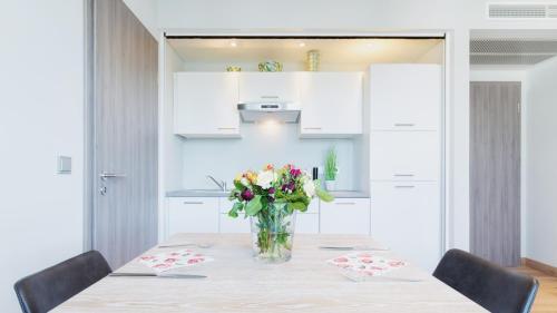 Kuchyň nebo kuchyňský kout v ubytování Heuboden Hotel Heu.Loft Freiburg