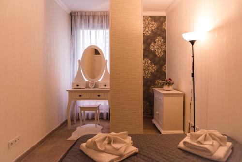 Kylpyhuone majoituspaikassa Lira Holiday Apartments