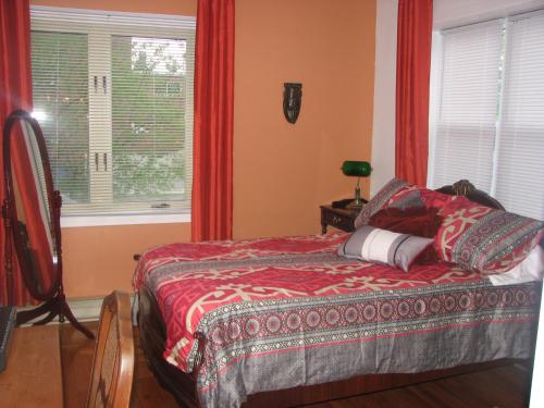 Postel nebo postele na pokoji v ubytování Magnolia B&B