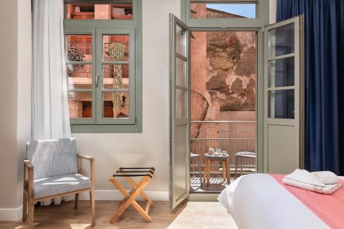 Ένα ή περισσότερα κρεβάτια σε δωμάτιο στο Viaggio Elegant Rooms