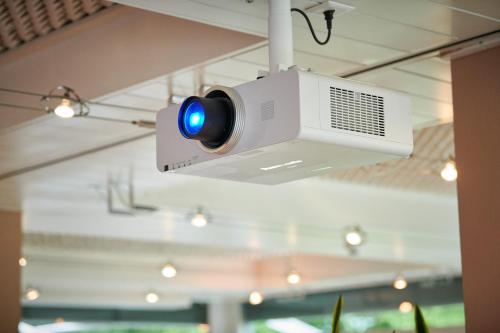 a security camera is hanging from a ceiling at Hotel Holiday Thun in Thun