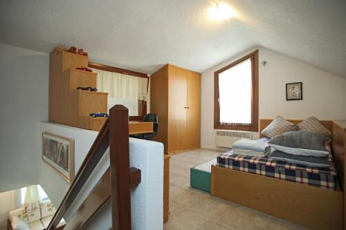 a room with a bed and a desk in it at Villa Sanni Retreat by Luxlikehome in Sani Beach
