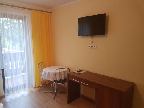 Televízia a/alebo spoločenská miestnosť v ubytovaní U Andzi