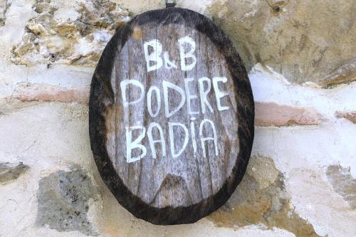 a sign that says bd police barbia on a stone wall at Podere Badia Valdrago Agriturismo Mugello Circuit in Scarperia