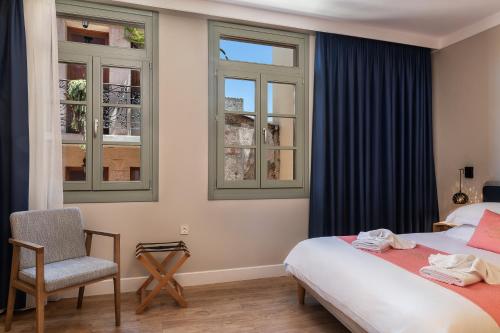 Ένα ή περισσότερα κρεβάτια σε δωμάτιο στο Viaggio Elegant Rooms
