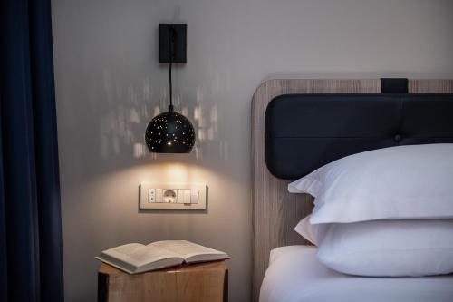 Ένα ή περισσότερα κρεβάτια σε δωμάτιο στο Viaggio Elegant Rooms