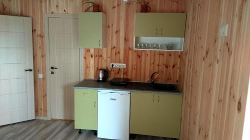 Kuchyň nebo kuchyňský kout v ubytování Eco House