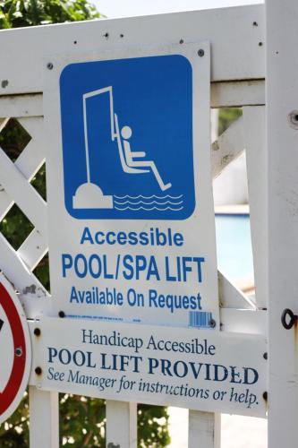 a sign for aapy pool in the water at Southern Oaks Inn - Saint Augustine in Saint Augustine