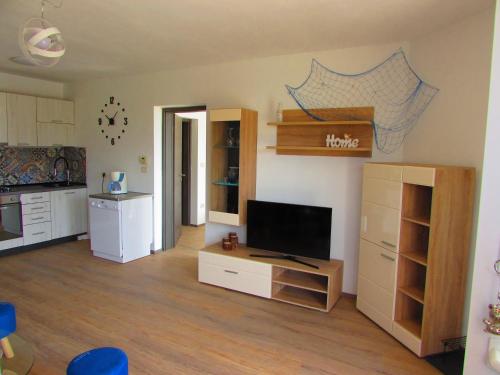 Η κουζίνα ή μικρή κουζίνα στο Apartman Mimi