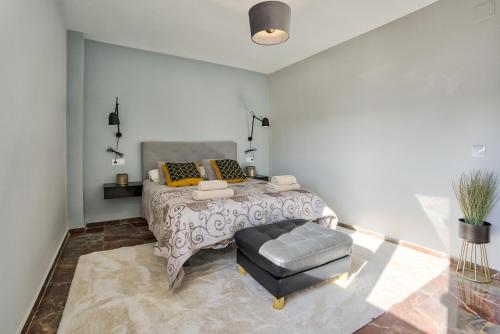 Cama o camas de una habitación en Sur Suites Lubina