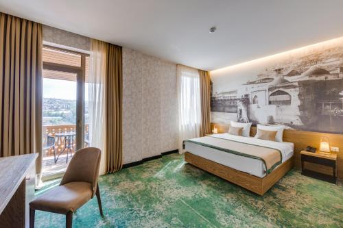Postel nebo postele na pokoji v ubytování Sole Palace