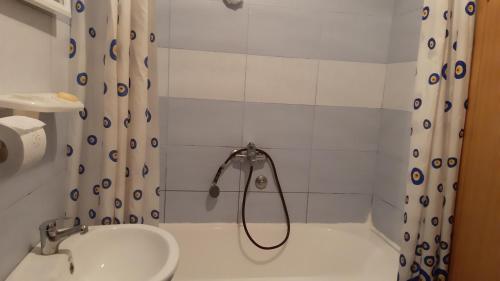 a bathroom with a shower and a sink at Apartments Jovana in Žabljak