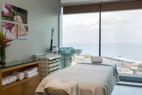 Postel nebo postele na pokoji v ubytování Enjoy Antofagasta