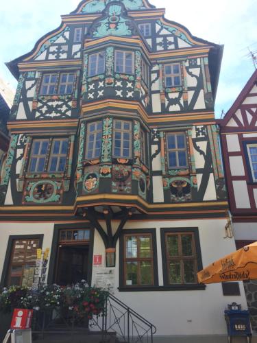 a building with a design on the side of it at Moderne Wohnung im Rhein-Main-Gebiet in Idstein