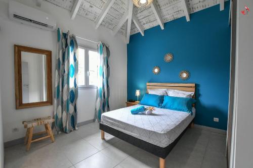 Postel nebo postele na pokoji v ubytování Farniente au soleil..