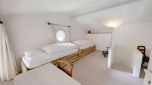 Una cama o camas en una habitación de Albana 305