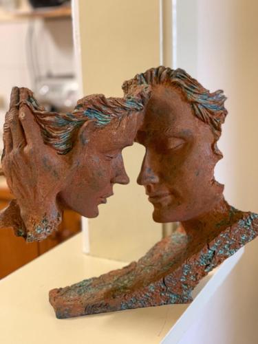 a statue of two people looking in a mirror at Barossa House in Tanunda