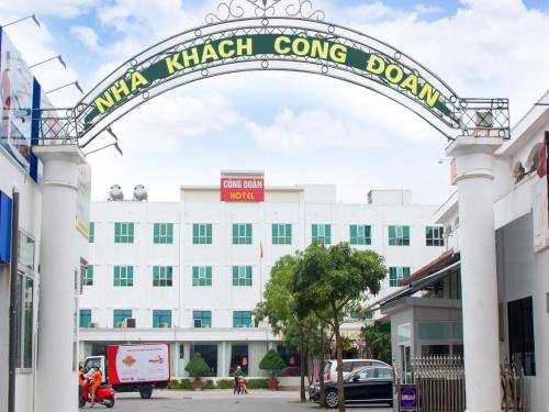 an archway in front of a white building at NK Công Đoàn Hải Dương in Hải Dương