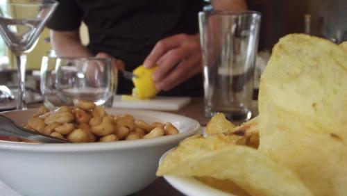 a plate of food on a table with a bowl of food at Villa Hotel Del Sole in Chiusi