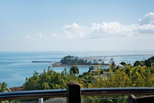 a view of the ocean from a balcony at Selah Retreat in Nelson