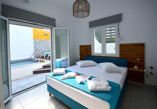 A bed or beds in a room at Villa Patroklos