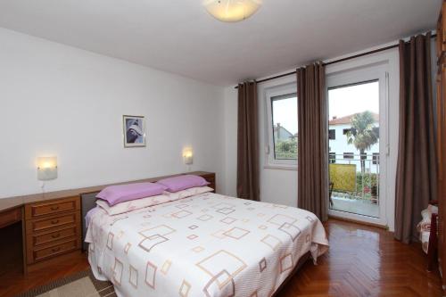 Posteľ alebo postele v izbe v ubytovaní Apartment Rokov
