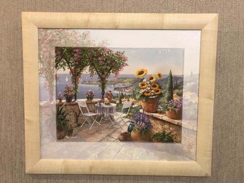a picture of a painting of a garden with flowers at DAUGAVPILS in Daugavpils