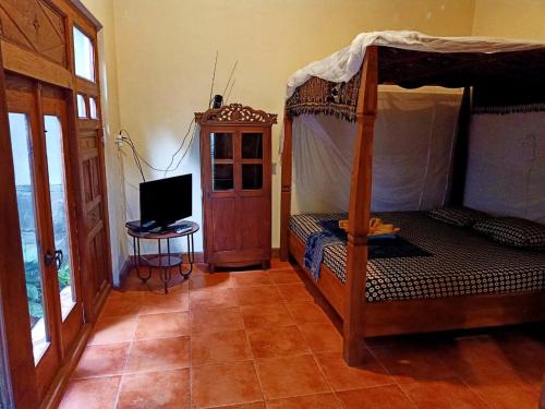 Кровать или кровати в номере Bedhot Homestay