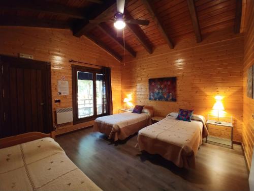 A bed or beds in a room at Casa del Valle