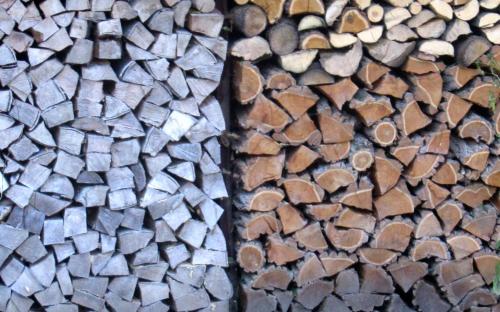 an overhead view of a pile of woodcuts at Cosy Authentic Farmhouse - LaComte5 in Vielsalm