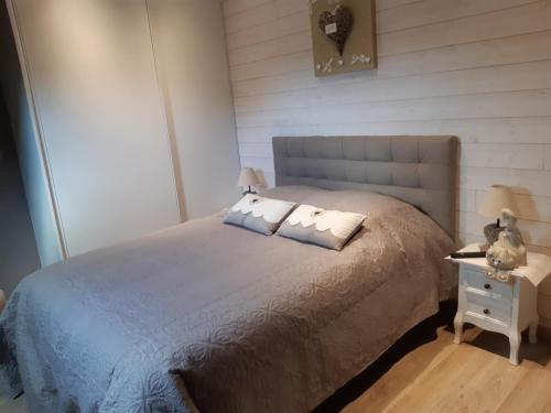 Llit o llits en una habitació de Cosy Maison Honfleur