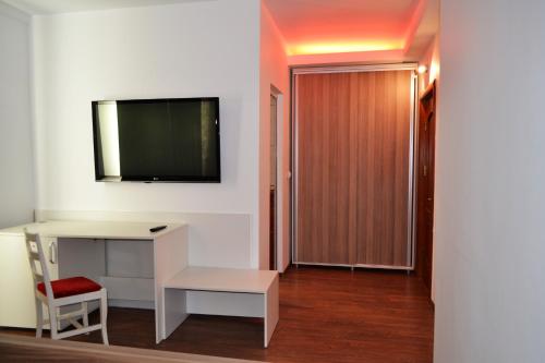 TV a/nebo společenská místnost v ubytování Hotel Rehoma