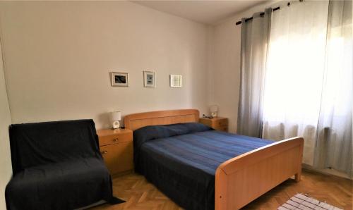 Postel nebo postele na pokoji v ubytování Apartments VESNA