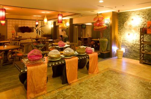 Un restaurante o sitio para comer en Howard Villa